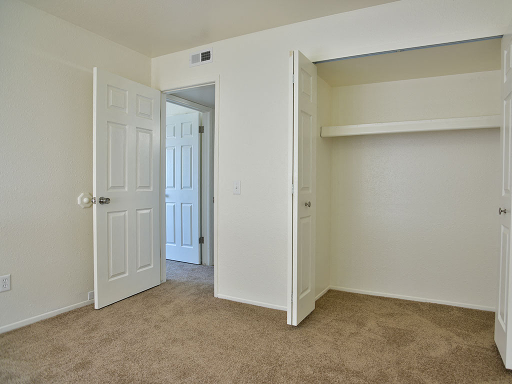 Bedroom with Carpeting at Huntington Place, Essexville, Michigan