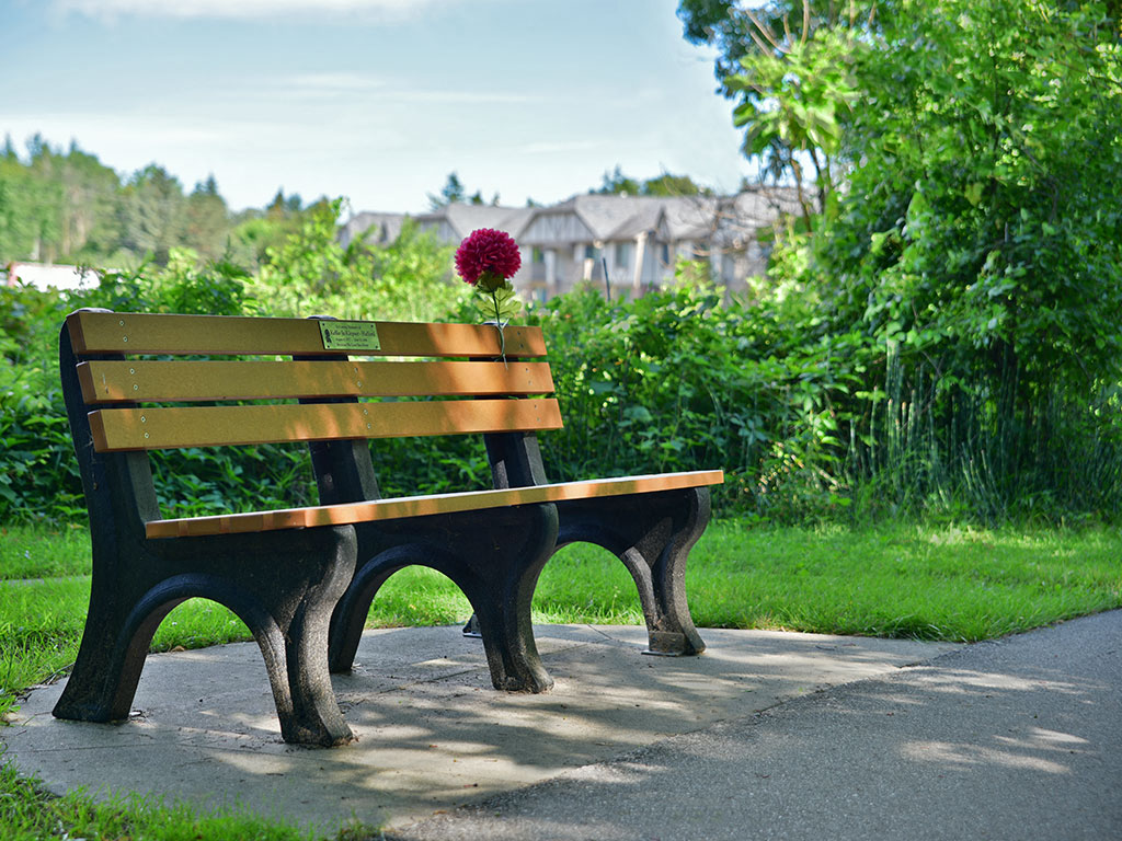 Bench Along Walking Trail at Huntington Place, Essexville, 48732