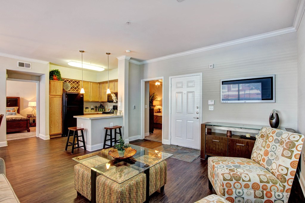 a living room with a couch and a table