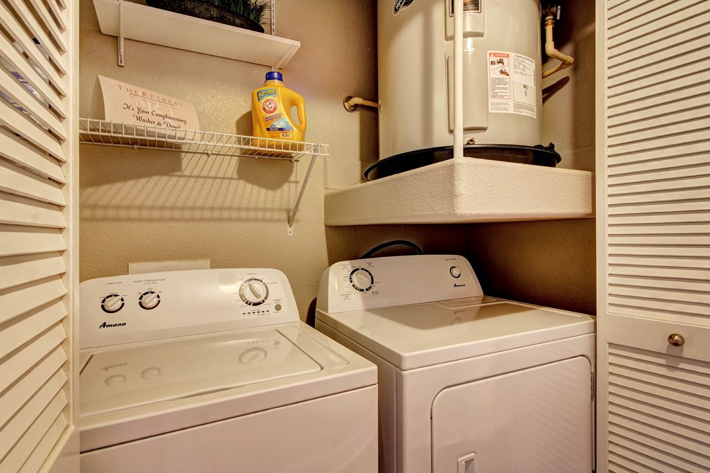 a washer and dryer in the laundry room of a home