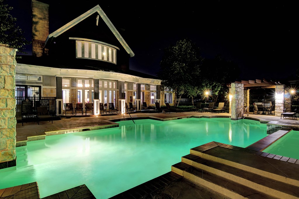 the swimming pool at night at the resort at night