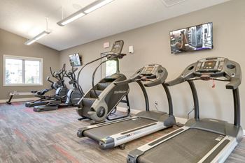 Treadmills and elliptical machines in the Highland View fitness center