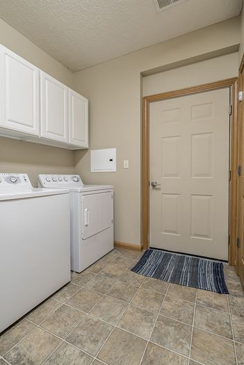 Full-size washer and dryer included