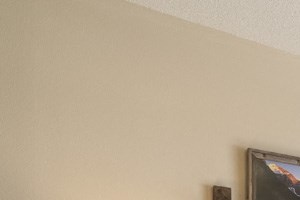 Interiors-Living room in 1-bedroom apartment with walkout patio