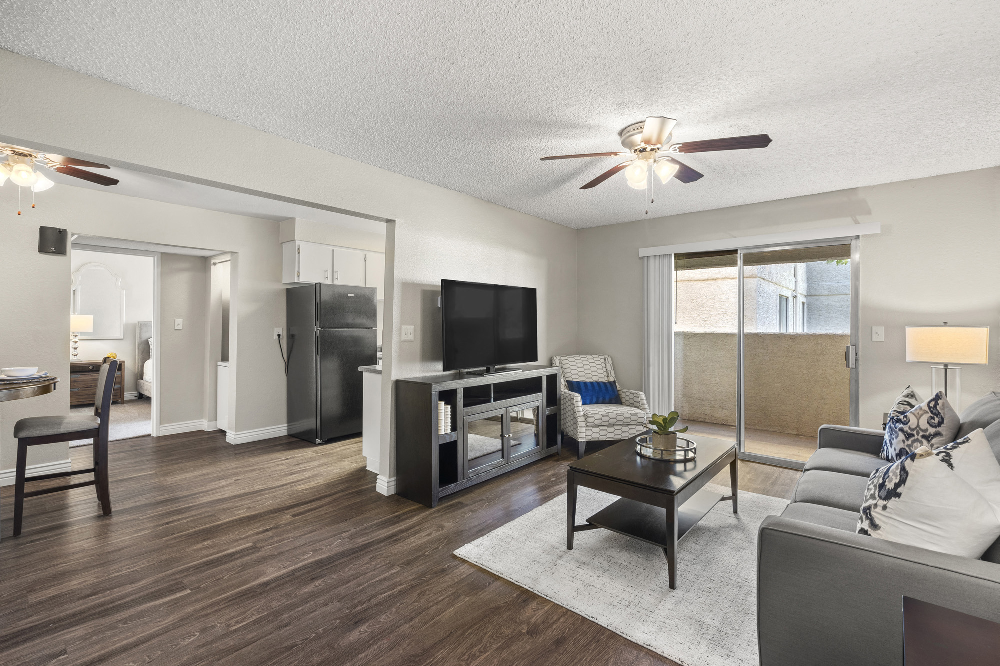 a living room with a couch and a tv