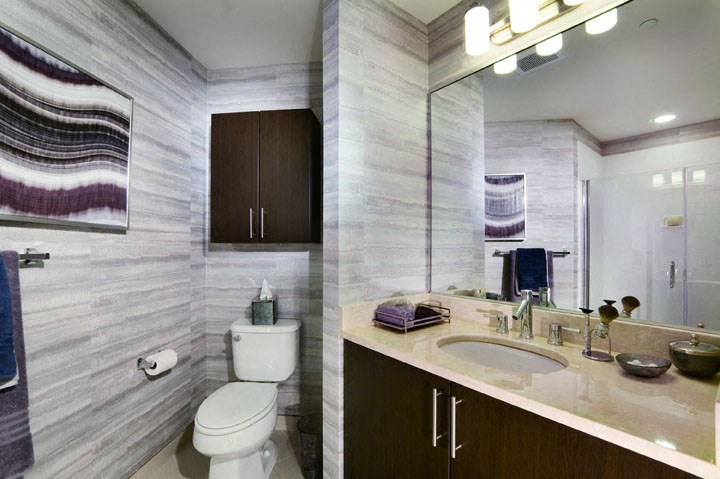 a bathroom with a toilet and a sink