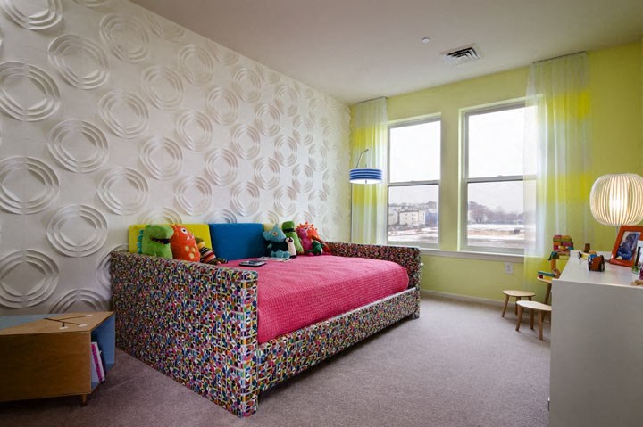 a bedroom with a bed and a couch in it