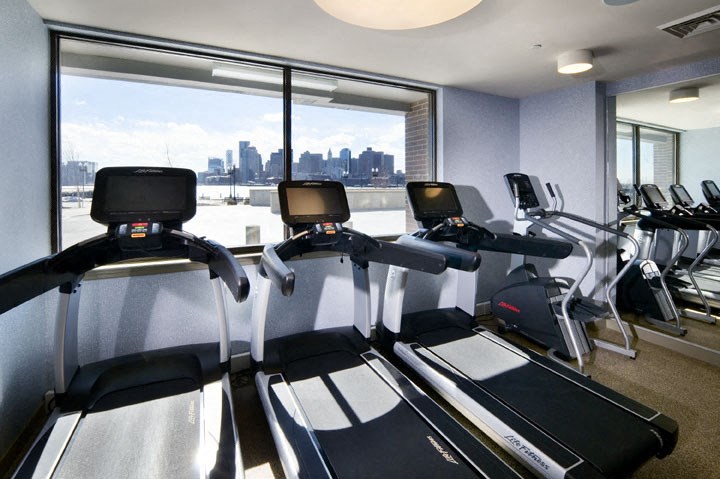 the gym with a view of the city