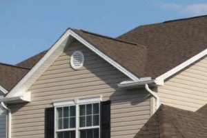 a large house with a garage and a driveway
