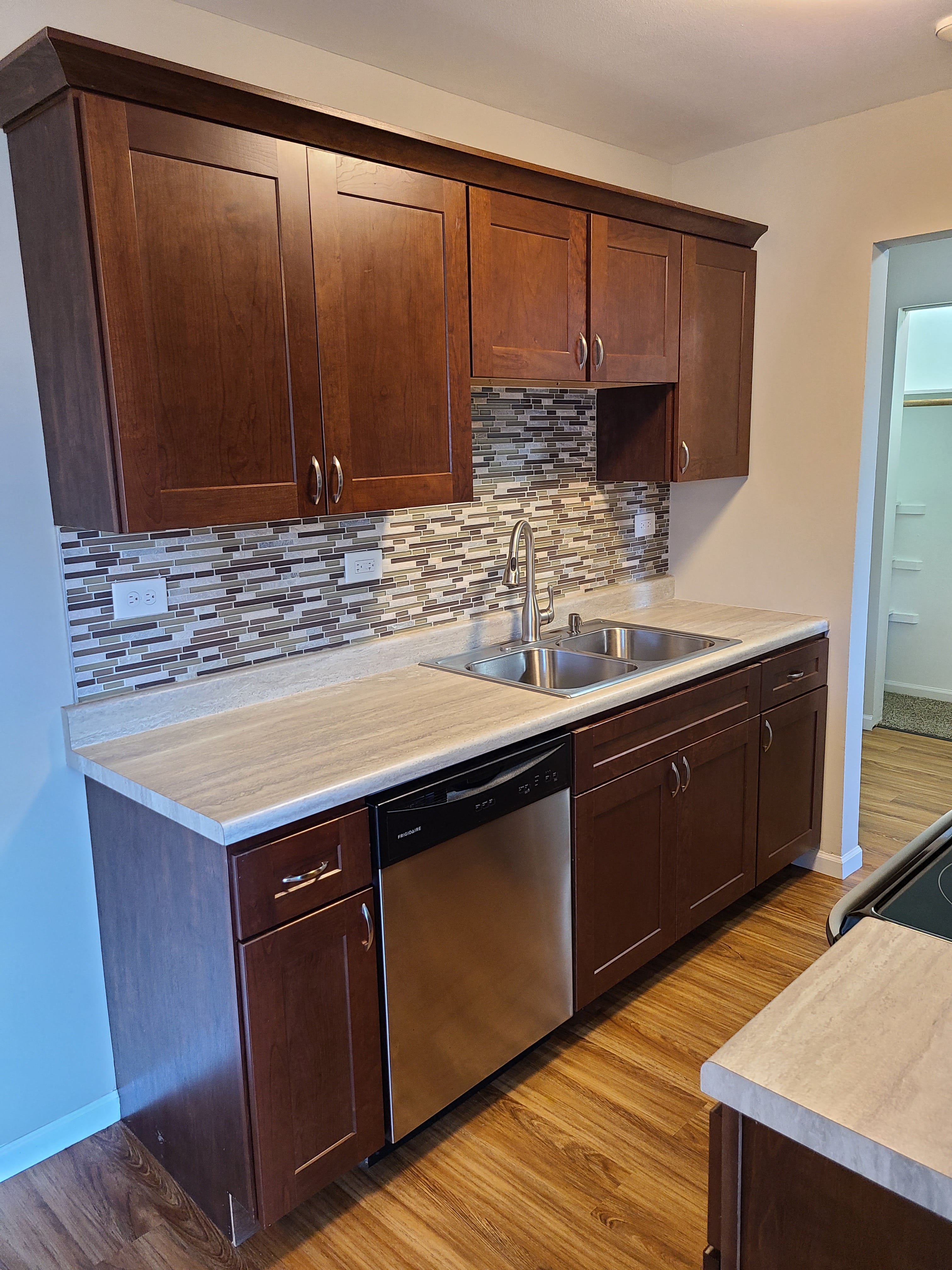 backsplash and stainless steel appliances