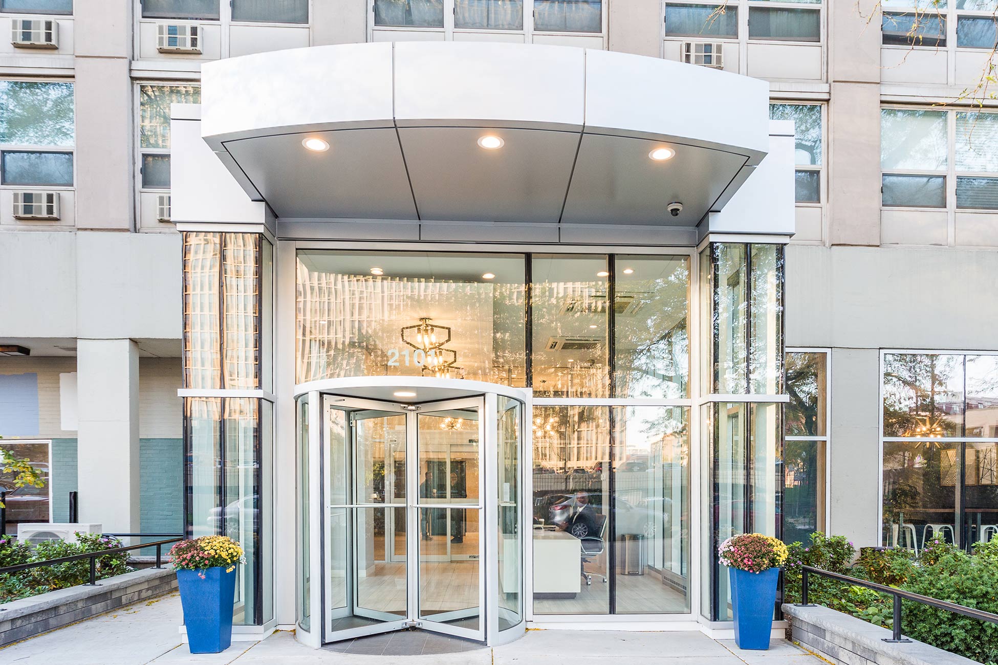 the entrance to a building with a revolving door