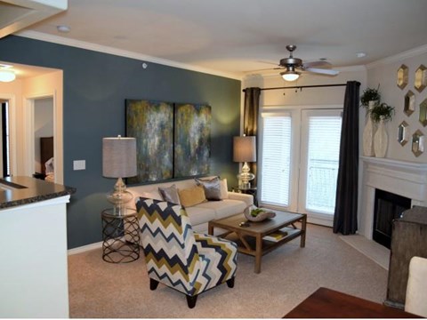 a living room with a couch and a table