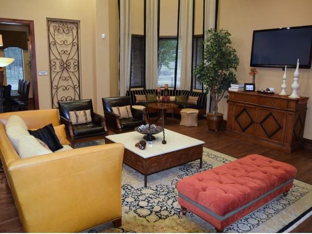 a living room with furniture and a television