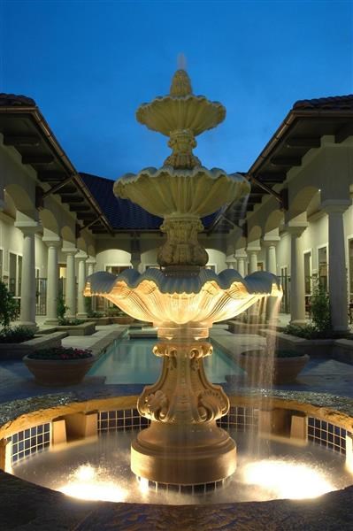 a large fountain in the middle of a building