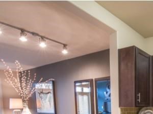 Luxurious kitchen, stainless steel appliances, stunning large islands and faux wood flooring.