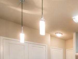 Luxurious kitchen, stainless steel appliances, stunning large islands and faux wood flooring.