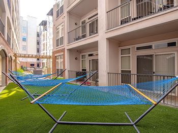 Relaxing Courtyards with Hammock Garden and Outdoor TV Lounge