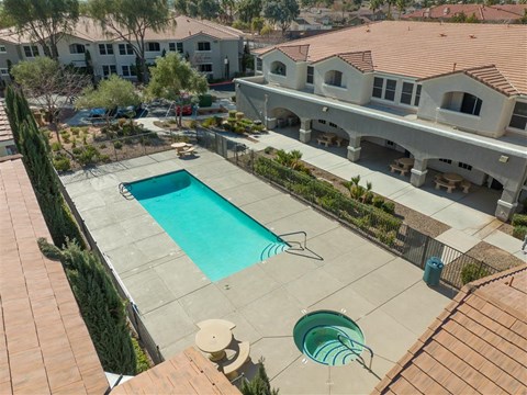 a view of the pool from the roof of a house