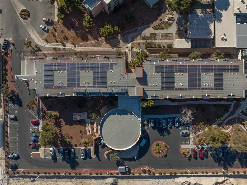 an overhead view of a parking lot and a parking