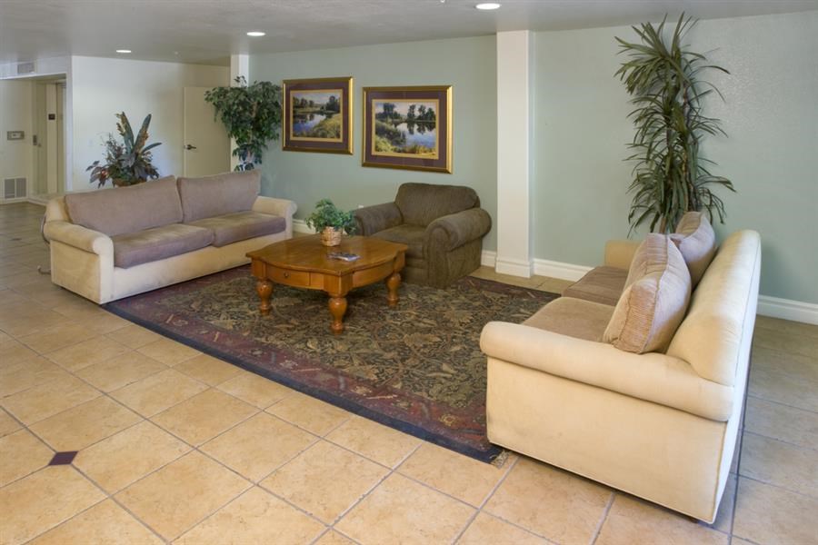a living room with couches and a coffee table