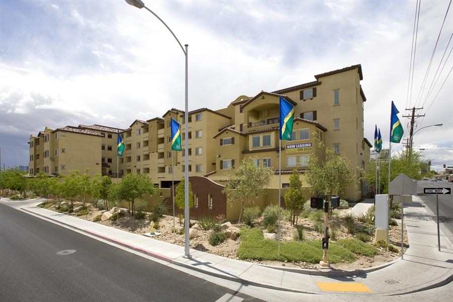 a large building on the corner of a street