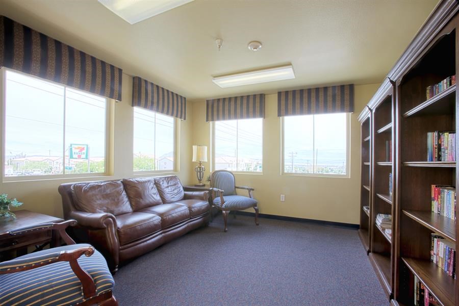 a living room with a couch and a chair