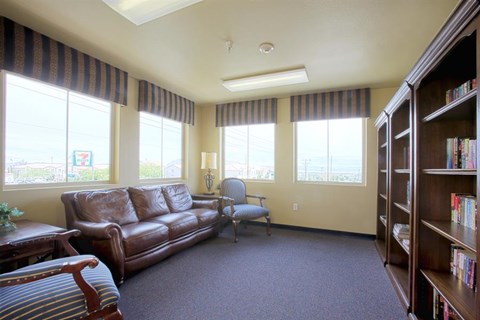a living room with a couch and a chair