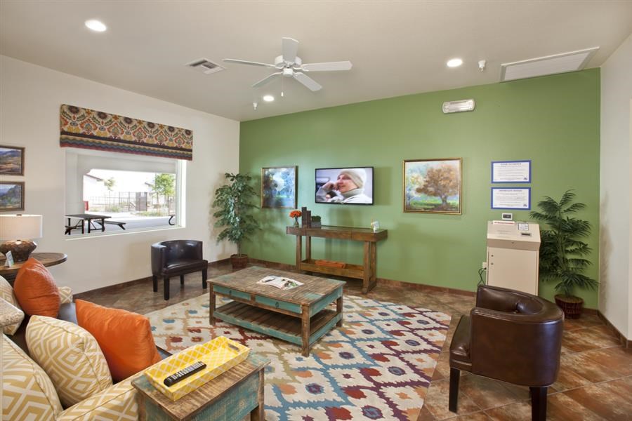 a living room with a couch and a table