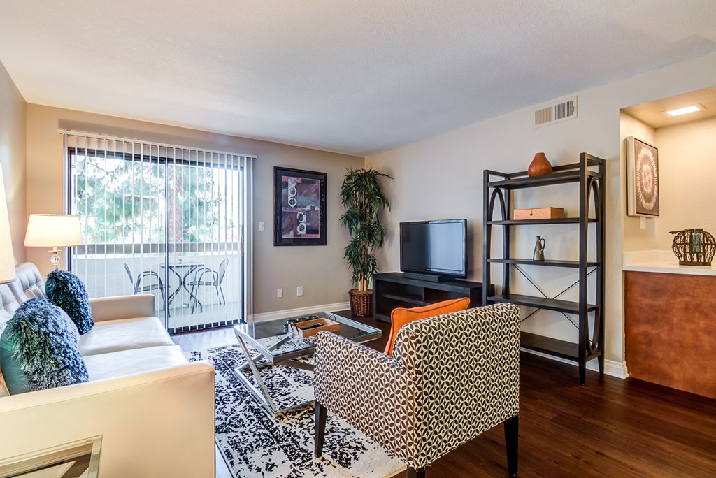 Living area with sliding glass doors to balcony