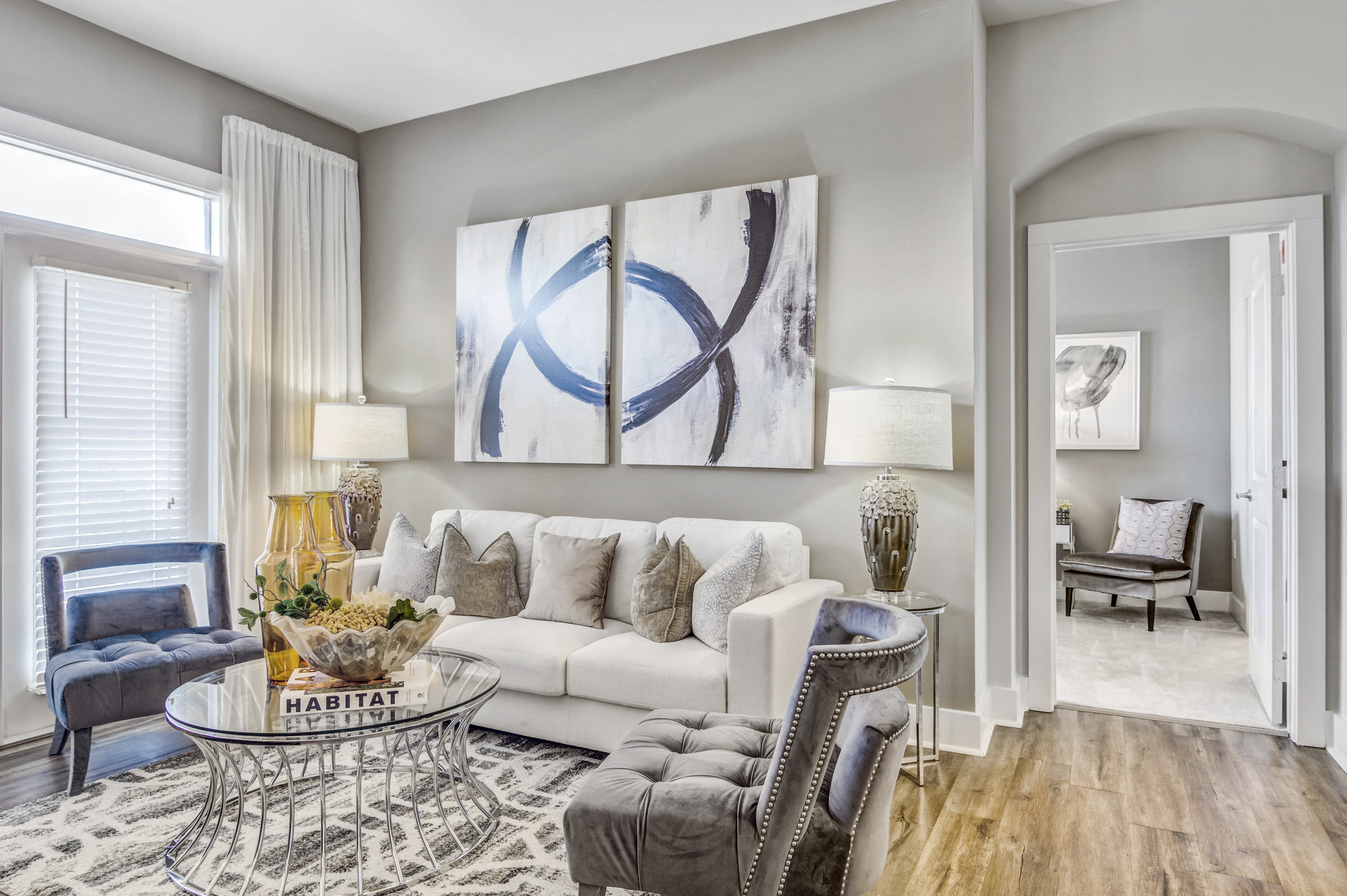 a living room with a couch and a table