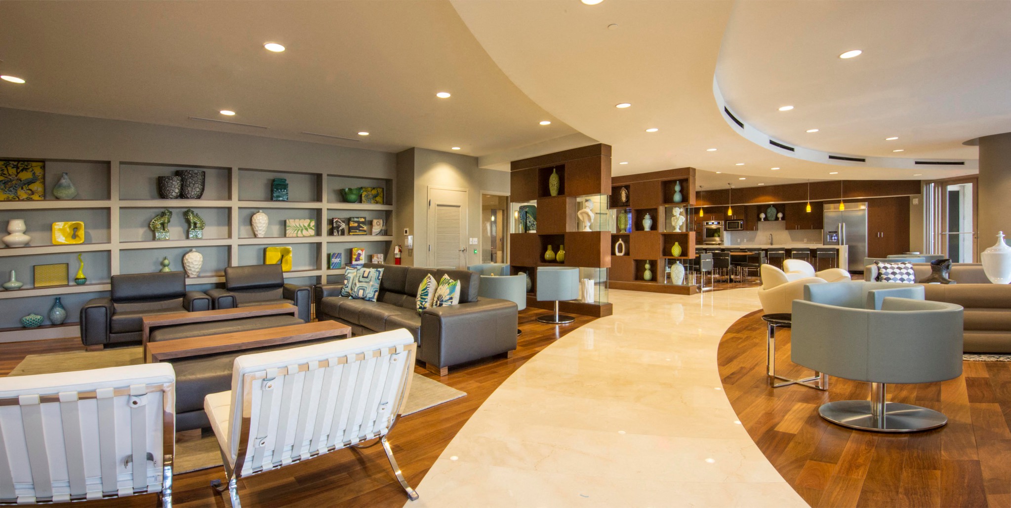 the lobby of a hotel with couches and chairs