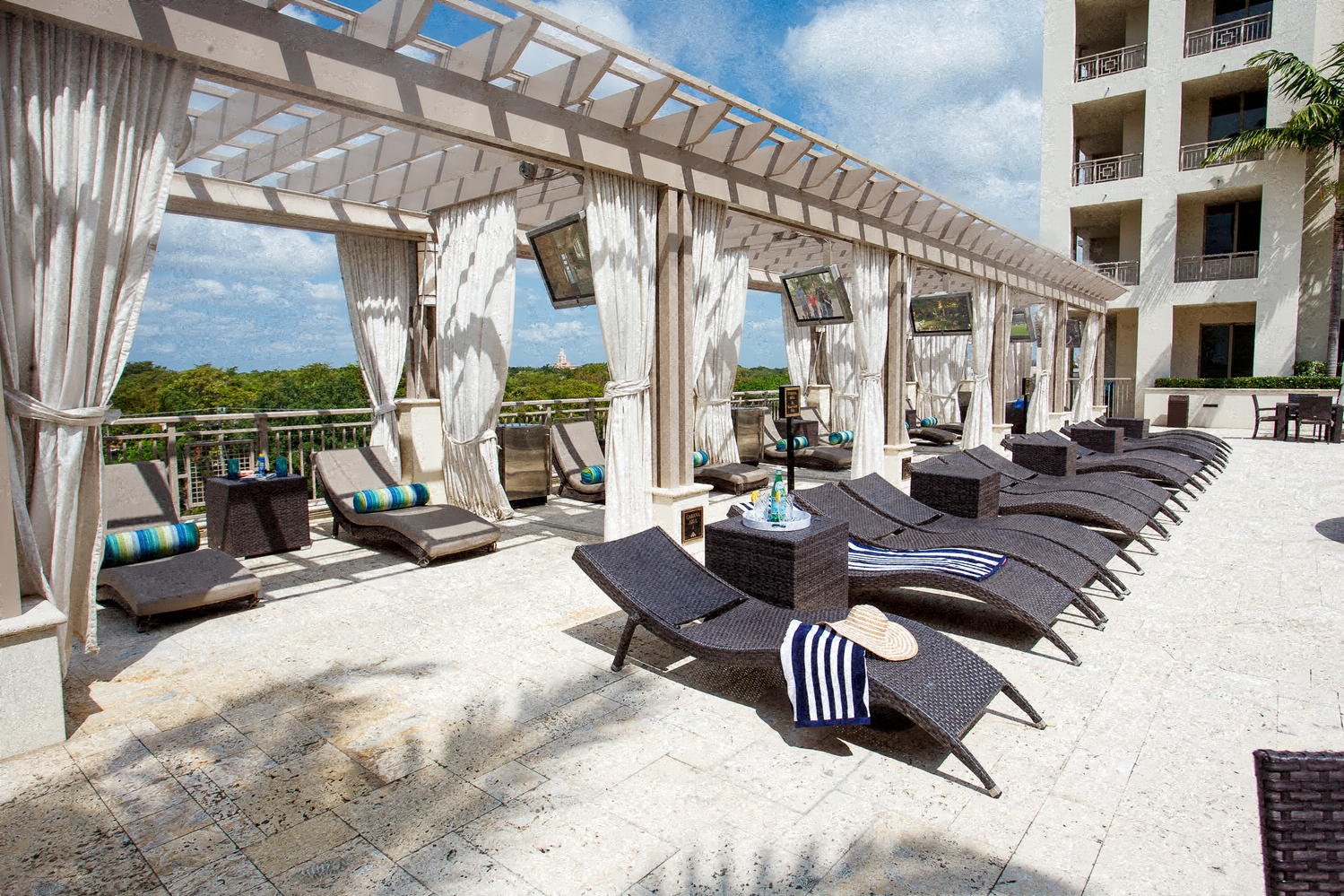 a view of the pool at the resort at longboat key club