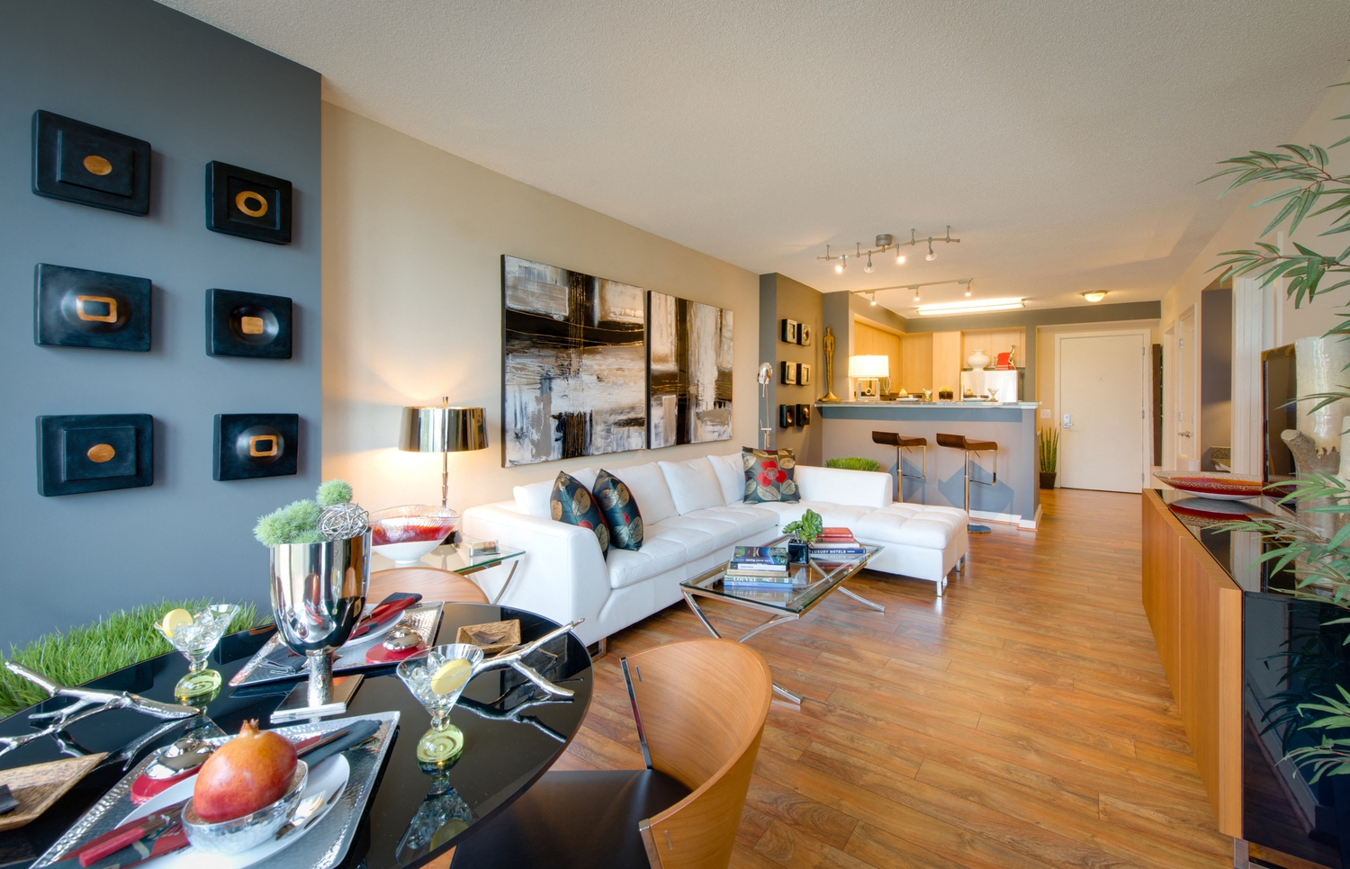 a living room with a dining room and a kitchen