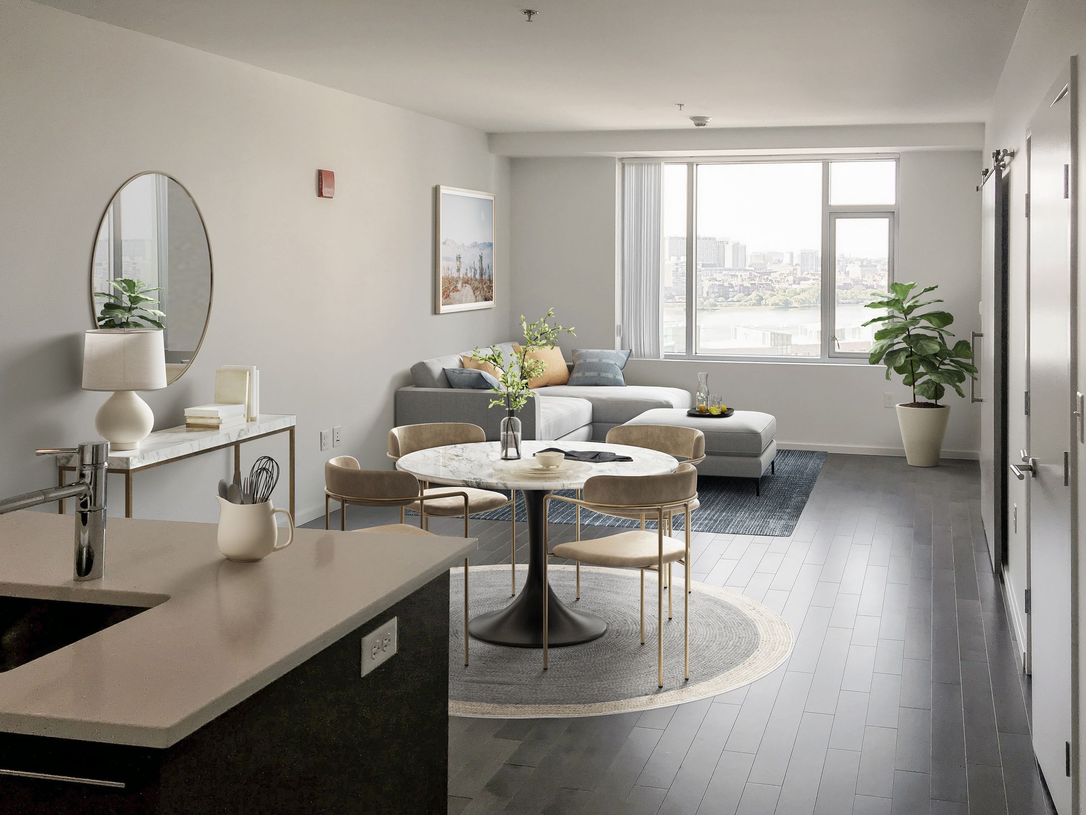 A modern kitchen with a dining table and chairs.