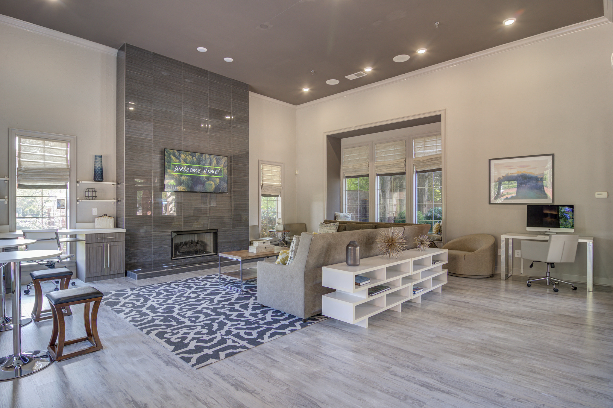 a living room with a couch and a fireplace