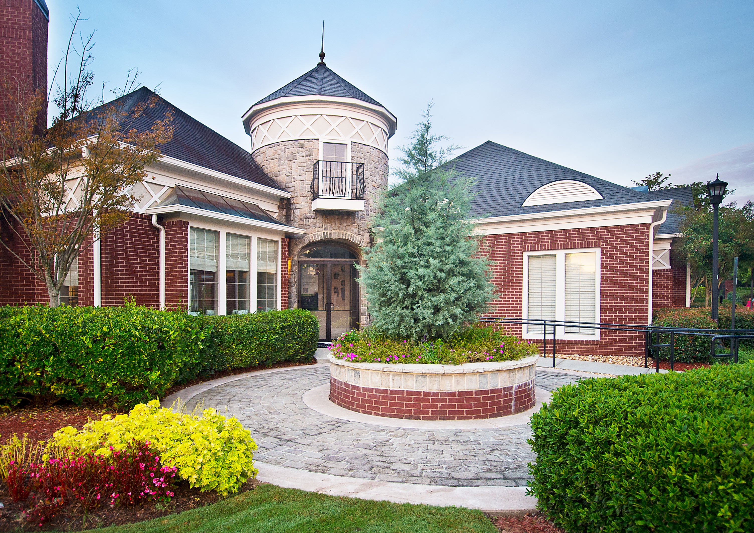 a house with a garden in front of it
