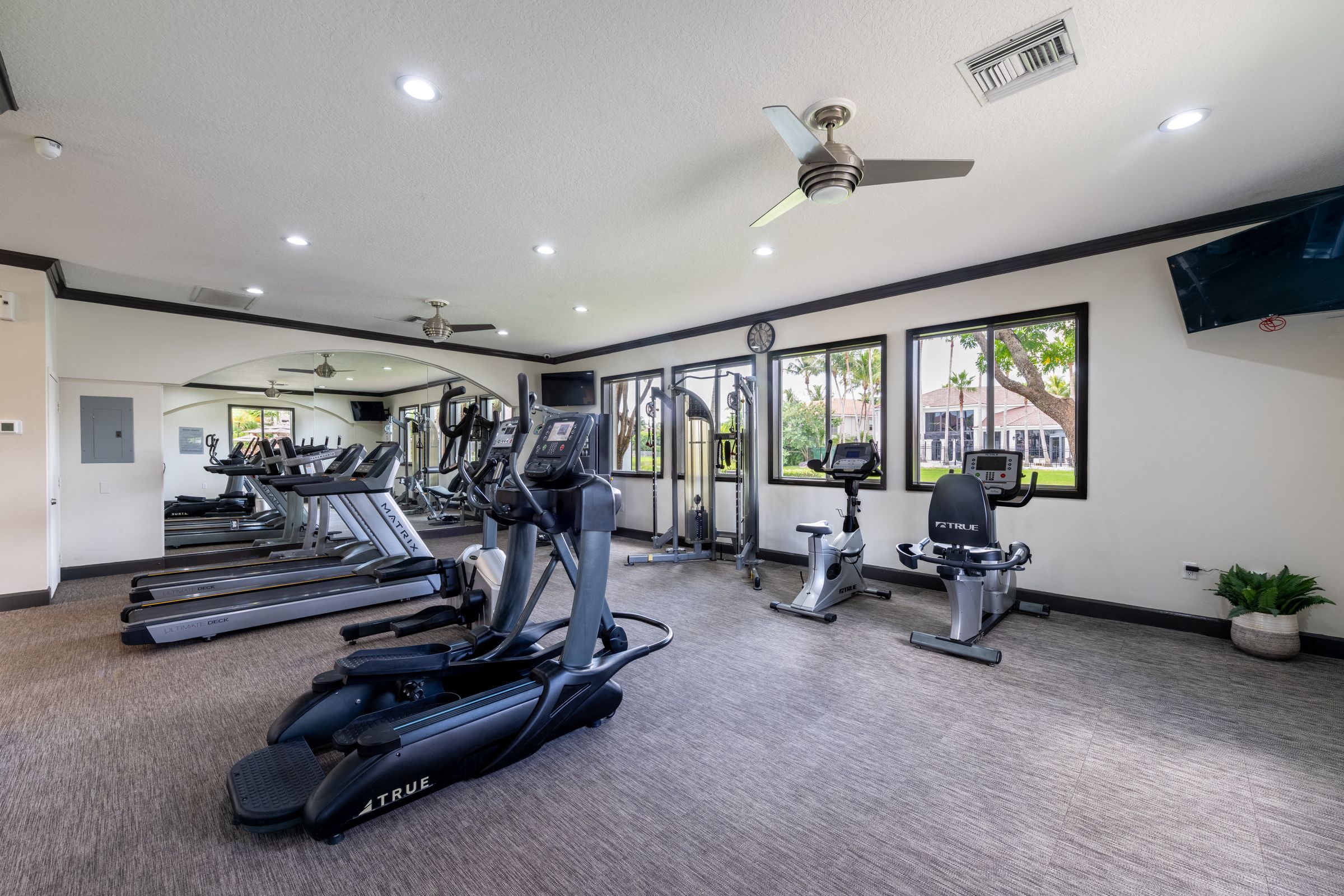 the gym at the preserve apartments in walnut creek cardio equipment and windows