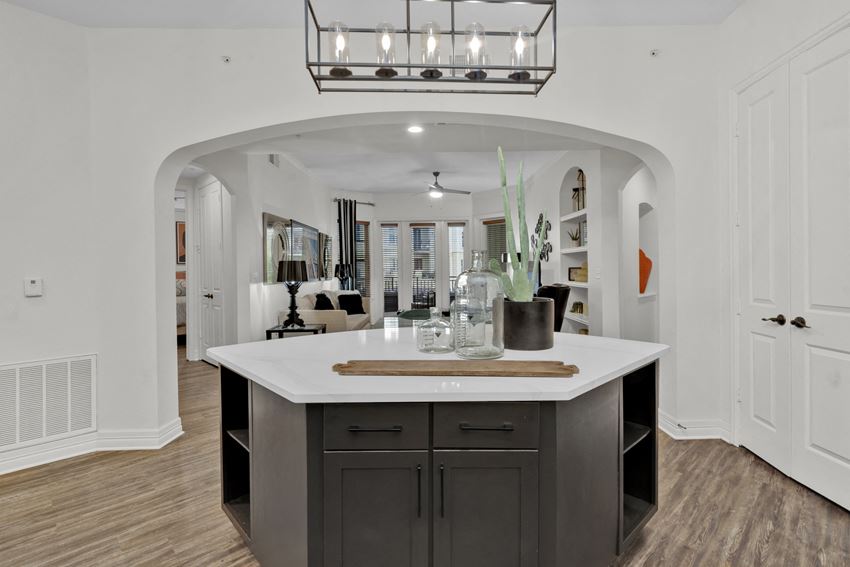 a kitchen with a large island in the middle