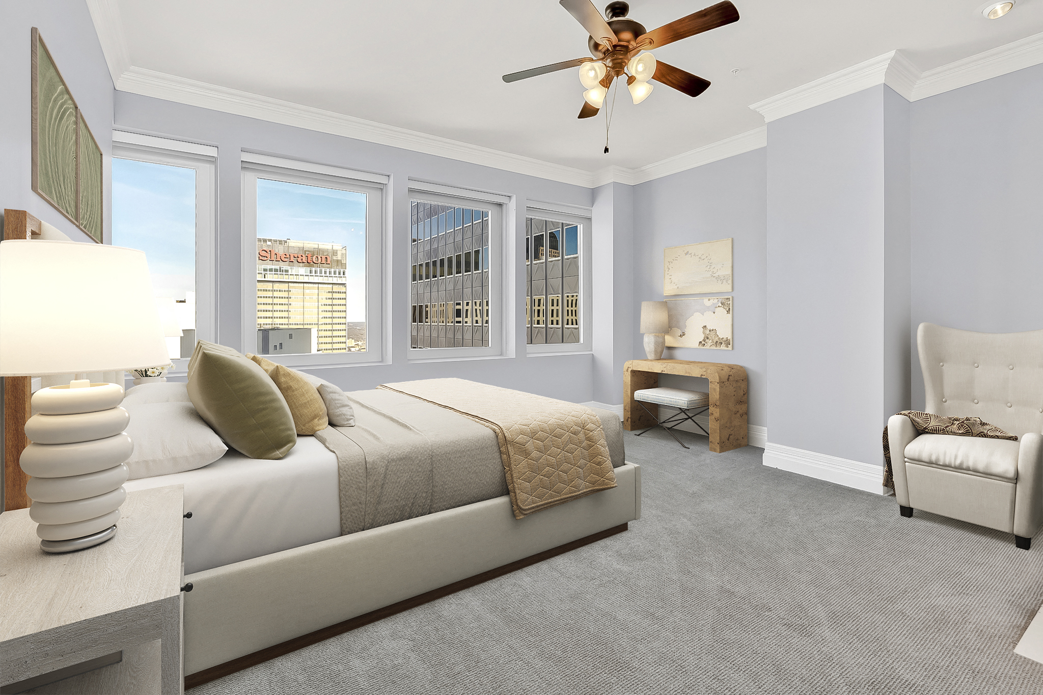 a bedroom with a bed and a ceiling fan