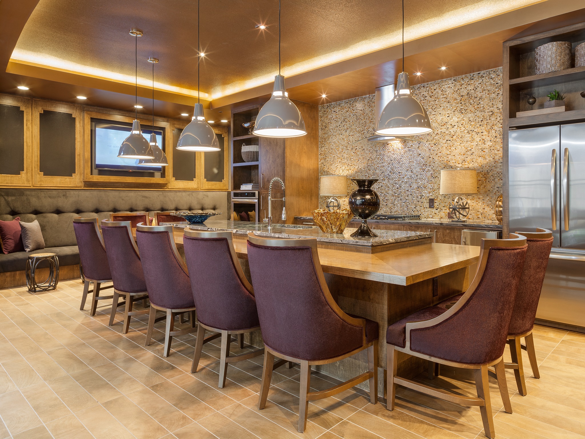 a large kitchen with a long table and chairs