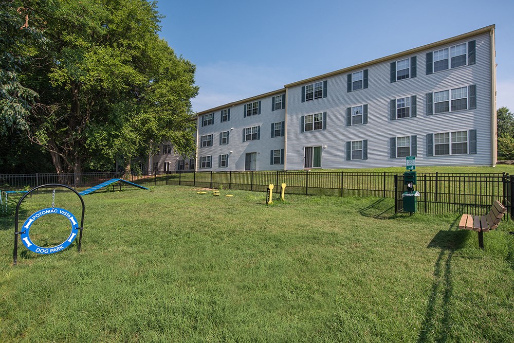 our apartments have a large fenced in yard with a playground