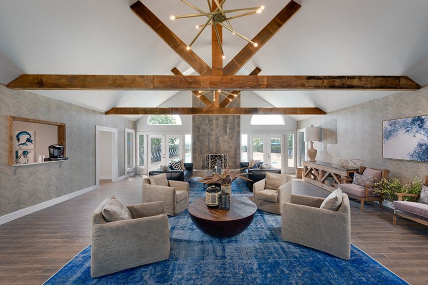 a living room with couches and a coffee table