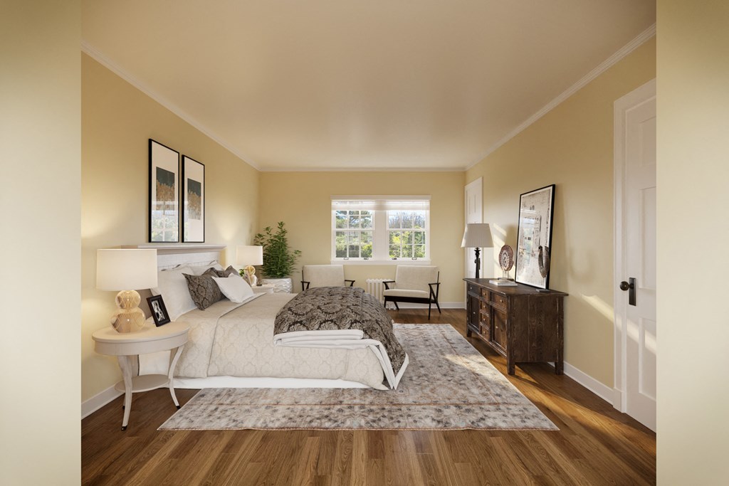 a bedroom with a bed and a dresser and a window