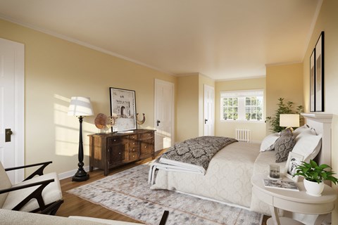 a bedroom with a bed and a dresser and a window