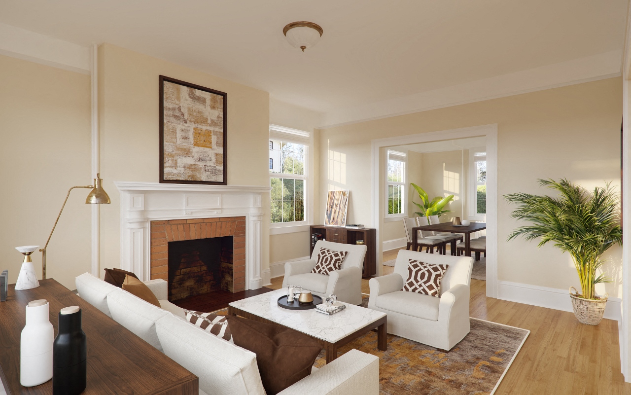 a living room with white furniture and a fireplace
