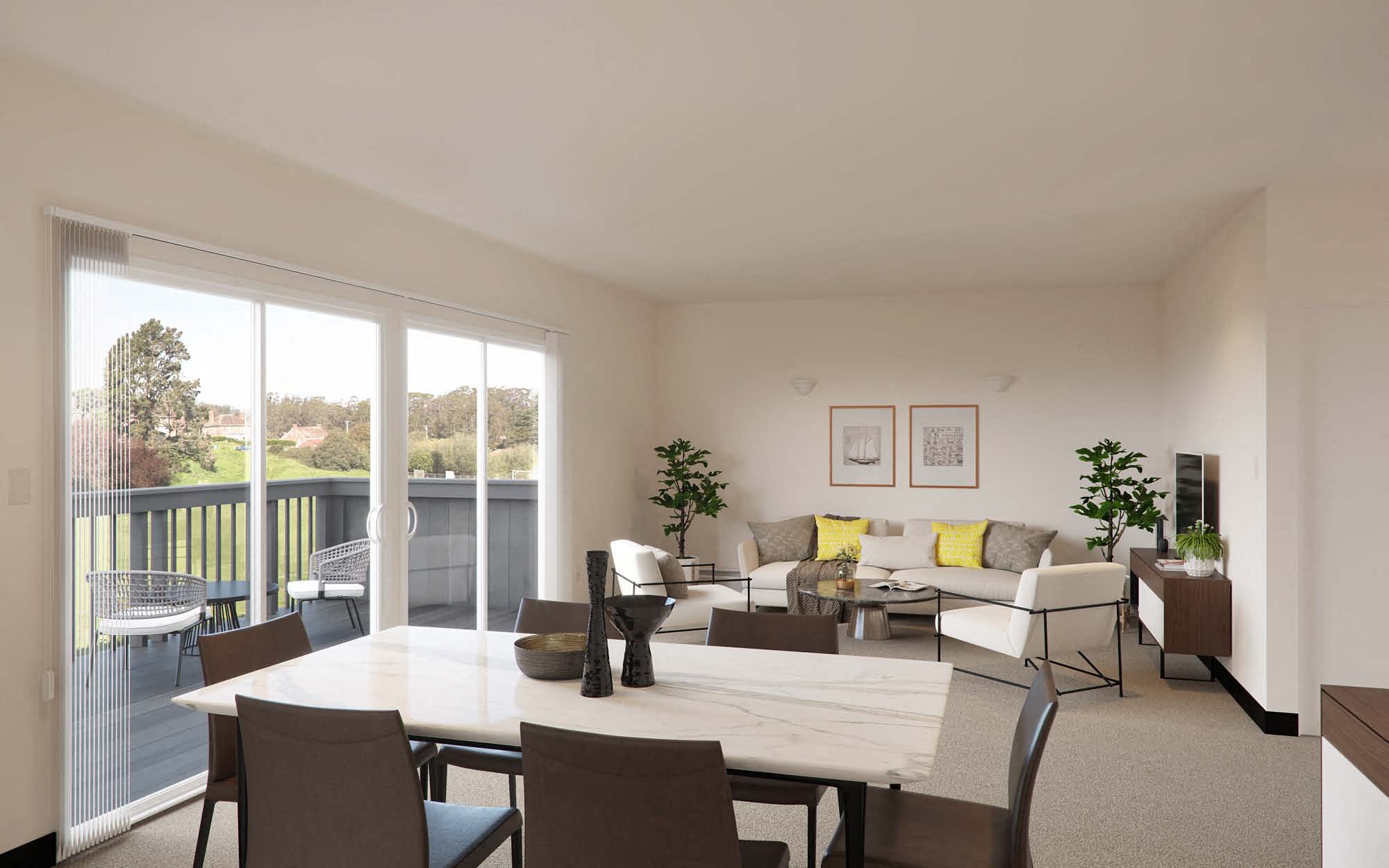 a living room with a table and a couch and a balcony