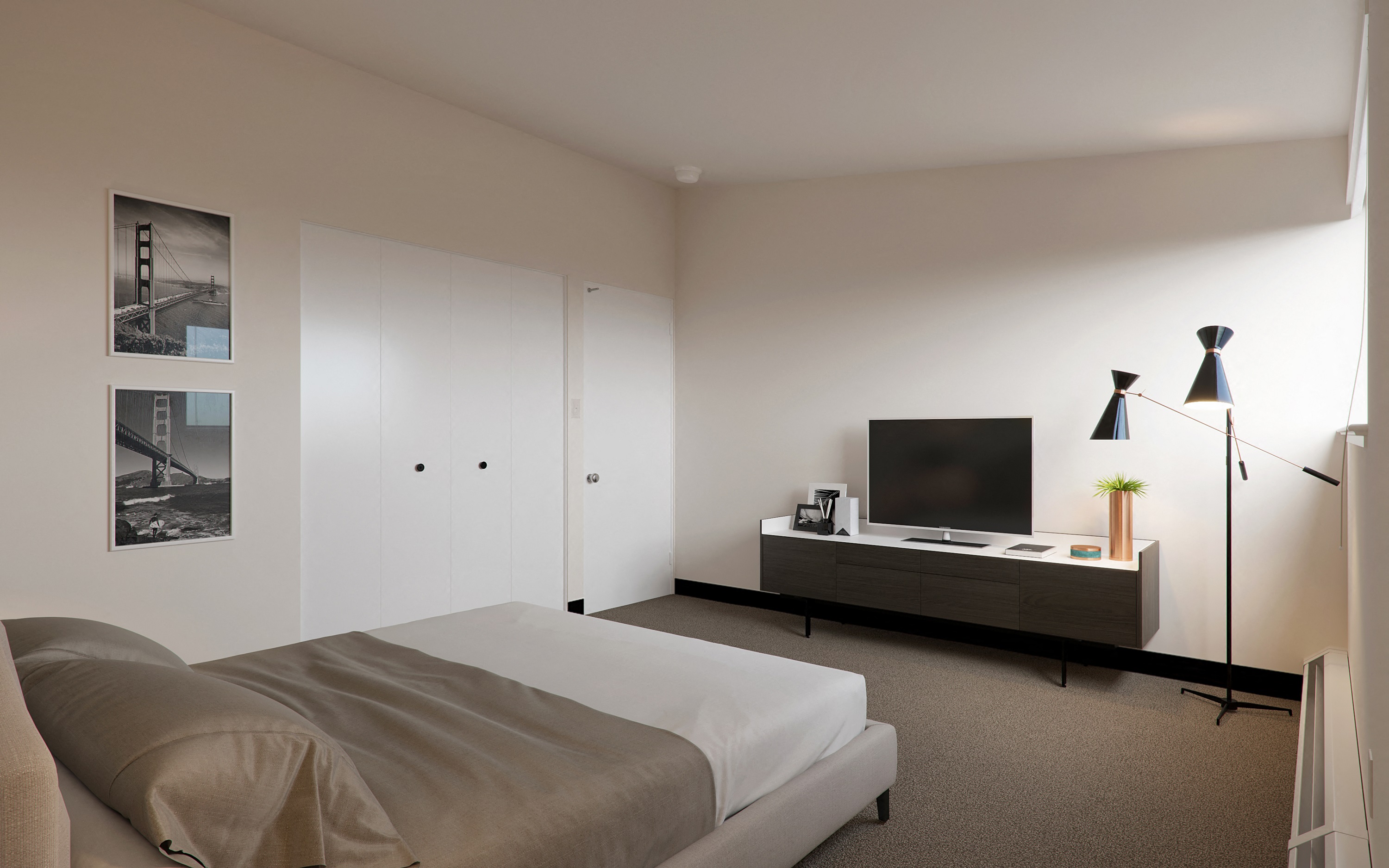 a bedroom with a bed and a tv on a dresser