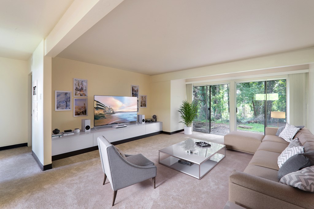 a living room with a couch and a coffee table