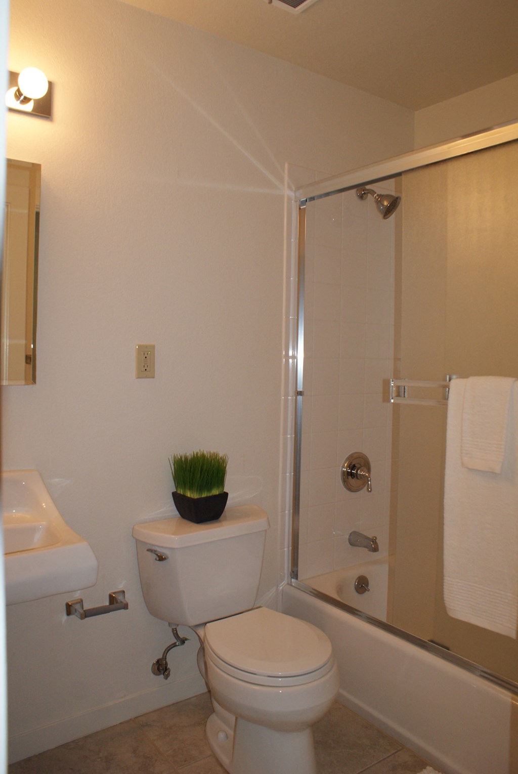 a small bathroom with a toilet and a shower