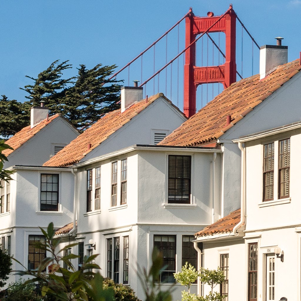 a house with the golden gate bridge in the background